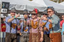 A group toasting at the Baytowne Wharf Beer Festival
